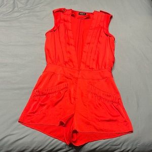 Bebe red low neck romper